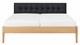 Bed Sky eiken met hoofdbord gecapitonneerd en poot hout, honing lederlook zwart