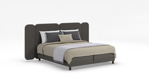 een bed met een hoofdeinde