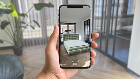 Beeld van telefoon die boxspring in 3D in eigen kamer toont