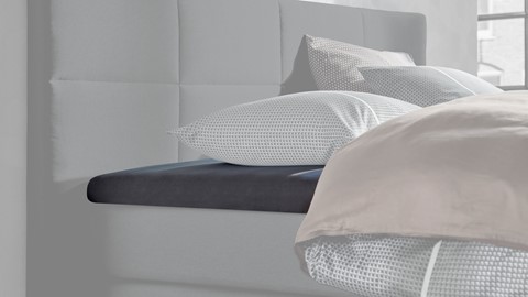 Kussens op een bed
