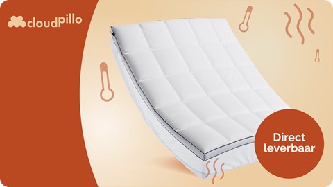 Een wit matras met een zwarte streep