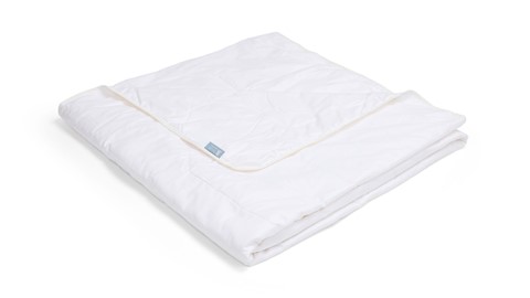 Een witte deken op een witte achtergrond