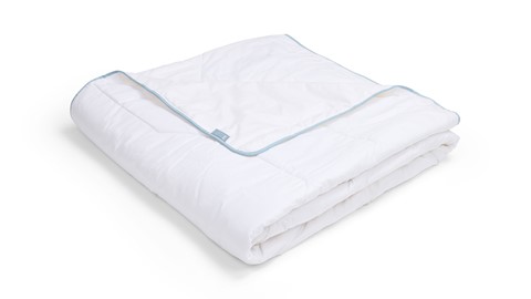 Een witte deken op een witte achtergrond