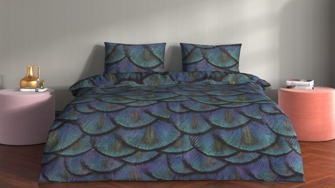 een bed met een sprei en kussens